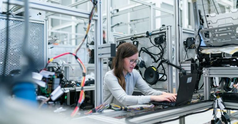 Scientific Technology - Photo Of Female Engineer Working On Her Workspace