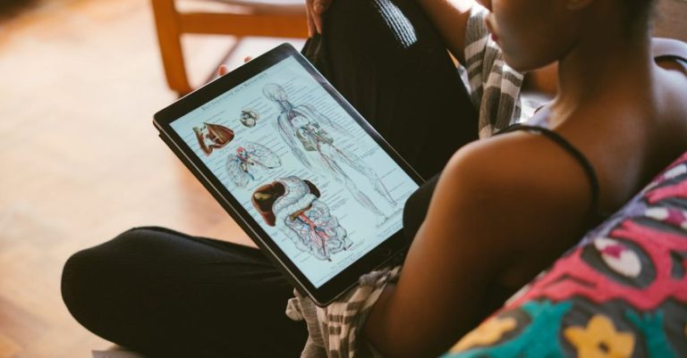 Anatomy - Photo Of Woman Studying Anatomy