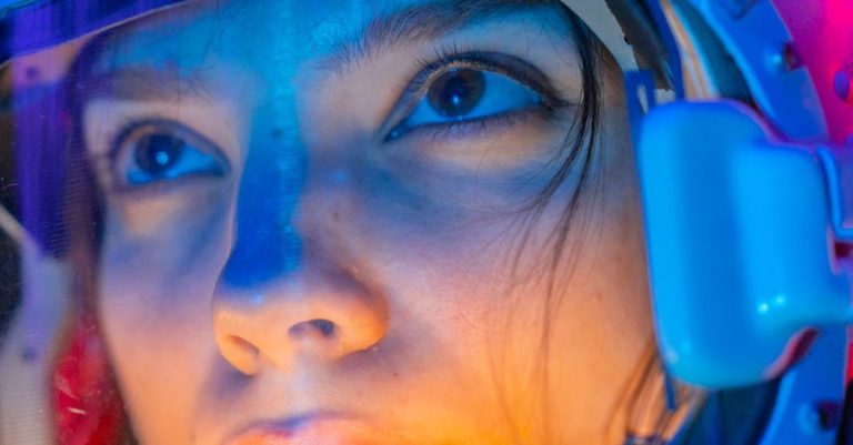 Scientific Technology - Woman in Blue Helmet