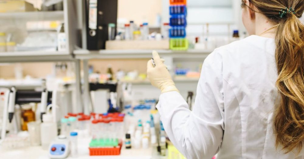 Laboratory - Woman In White Laboratory Gown