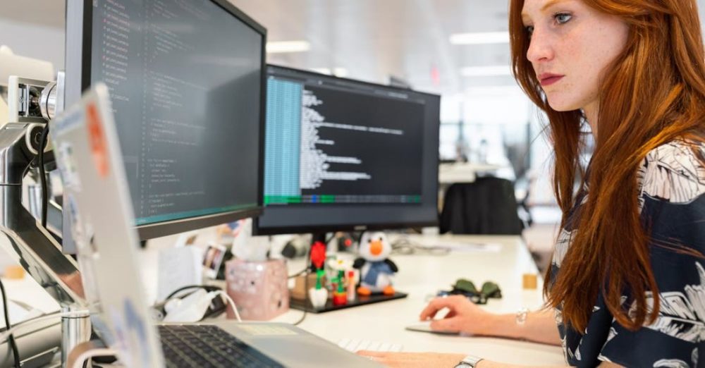 Scientific Technology - Woman Coding on Computer