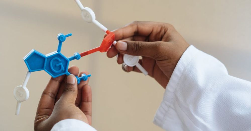 Scientific Technology - Crop chemist holding in hands molecule model