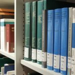 Scientific Research - Books on Shelf in Library